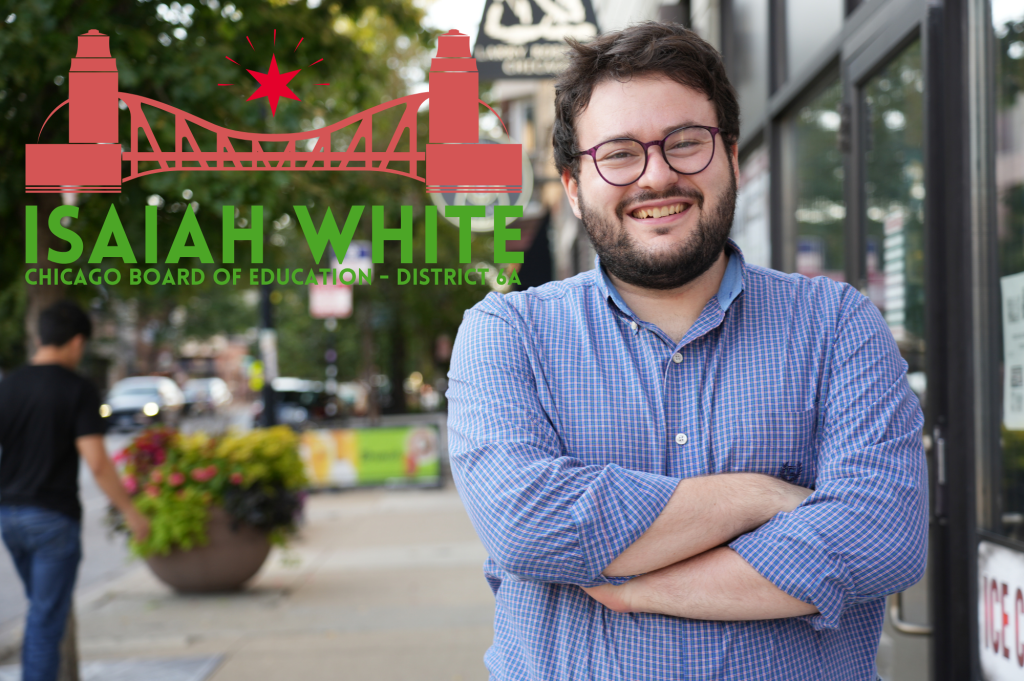 A smiling man with glasses stands outdoors with his arms crossed, wearing a blue checkered shirt. The background features greenery and a city street, along with a logo that reads 'Isaiah White, Chicago Board of Education - District 6'.